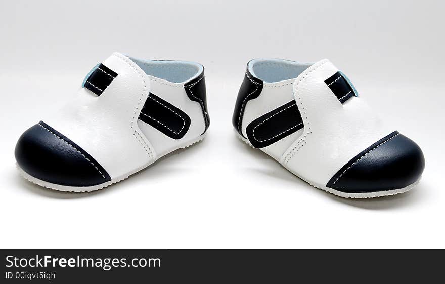 Cute baby shoes image on the white background