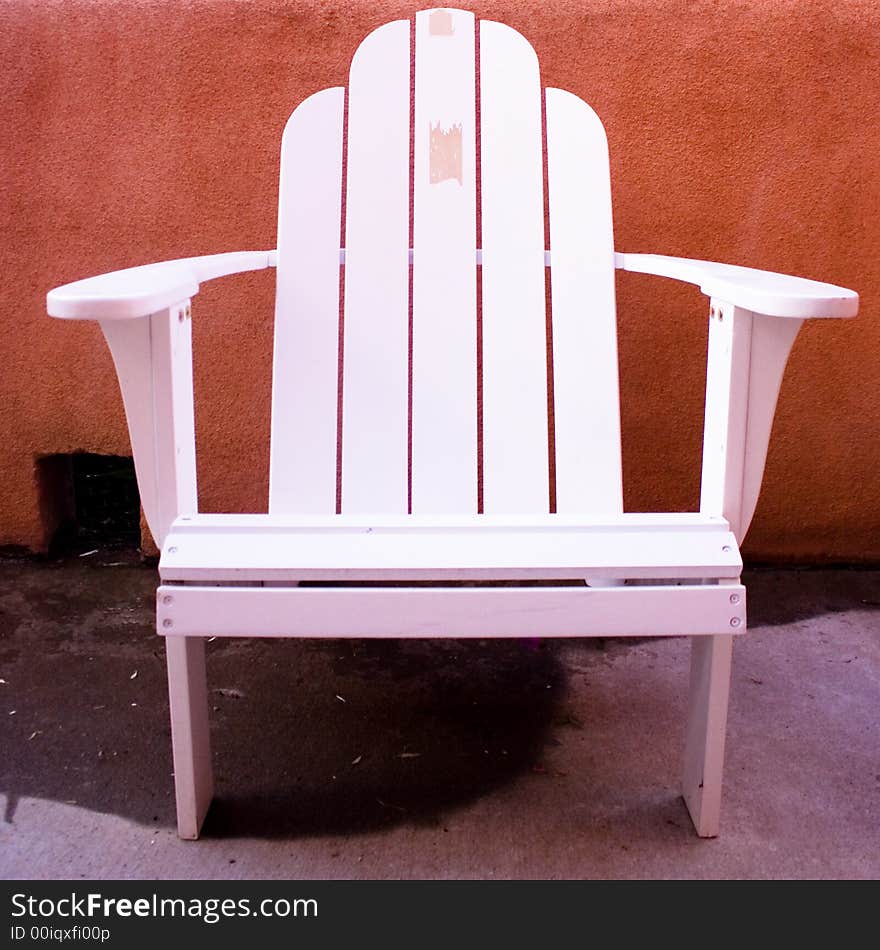 A house chair painted white. A house chair painted white