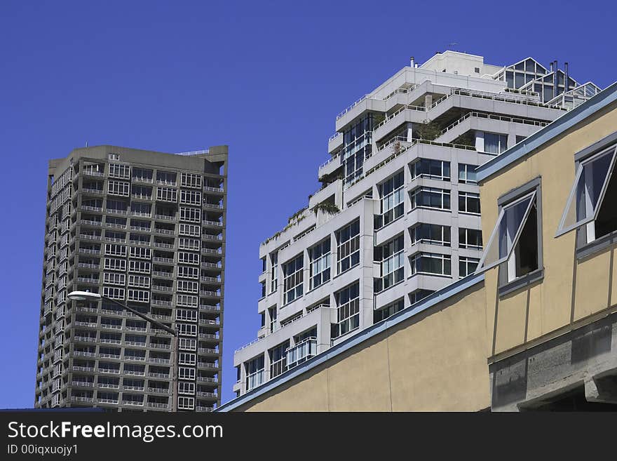 Modern apartments, condos, and office buildings living side by side. Modern apartments, condos, and office buildings living side by side