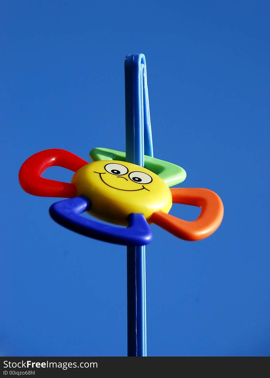 Beautiful colours toys image on the blue sky background