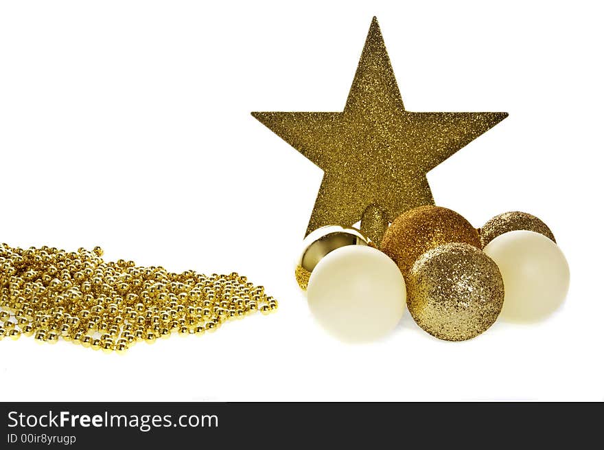 Complimentary golden & cream coloured christmas decorations. Complimentary golden & cream coloured christmas decorations