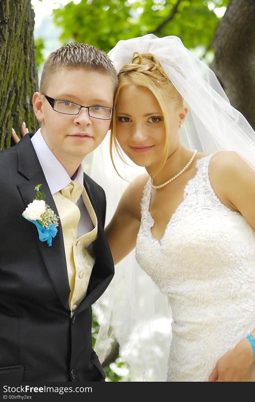 Bride and groom looking each to other. Bride and groom looking each to other