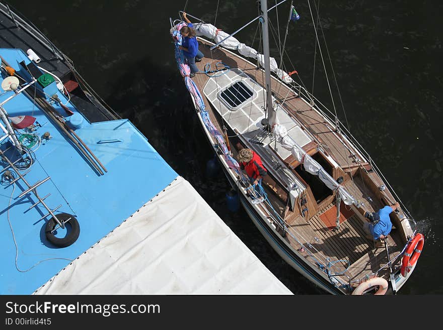 Fragmentary view at details of sailing ships moored near embankment (picture from The Tall Ships' Races 2007 in Szczecin)