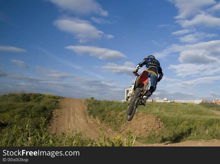 A motocross rider before touch-down. A motocross rider before touch-down