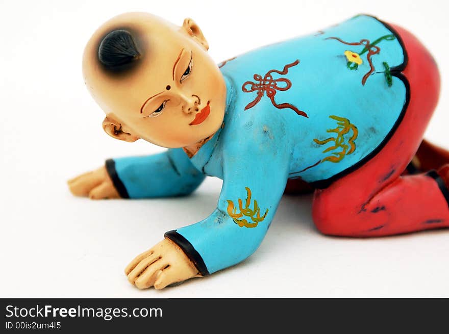 Small chinese figurine in white background