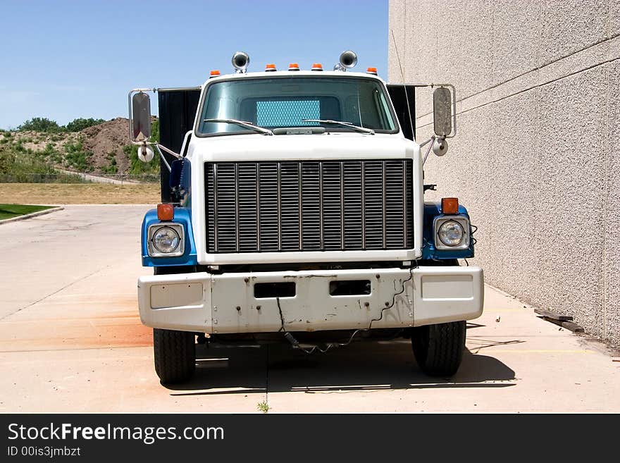 This is the front of a mid 1980's flat bed truck. This is the front of a mid 1980's flat bed truck.