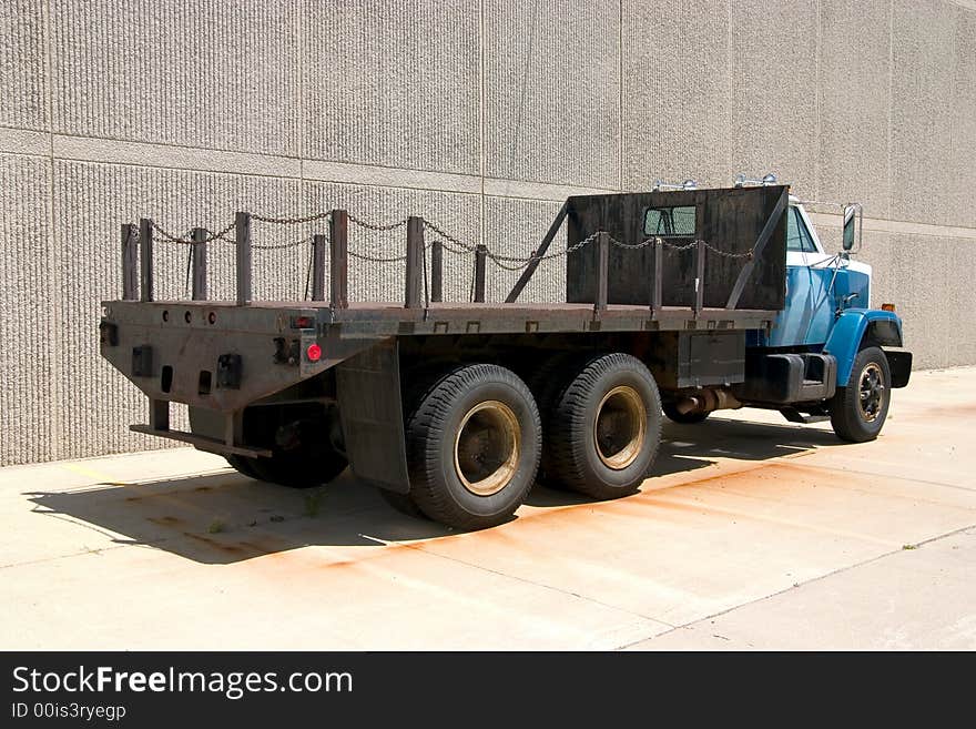 This is the rear view of a large flat bed stright truck. This is the rear view of a large flat bed stright truck.