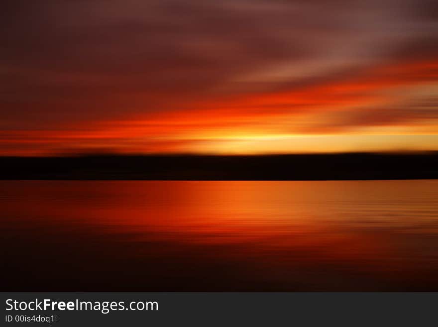 Deliberatly blurred abstract of a sunrise over Percy Priest Lake in Nashville. Deliberatly blurred abstract of a sunrise over Percy Priest Lake in Nashville