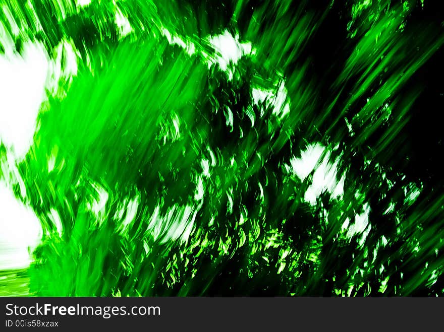 An abstract image created by using a slow shutter speed while moving and/or adjusting the focal length of the lens. Colors added and/or adjusted afterwards. An abstract image created by using a slow shutter speed while moving and/or adjusting the focal length of the lens. Colors added and/or adjusted afterwards.