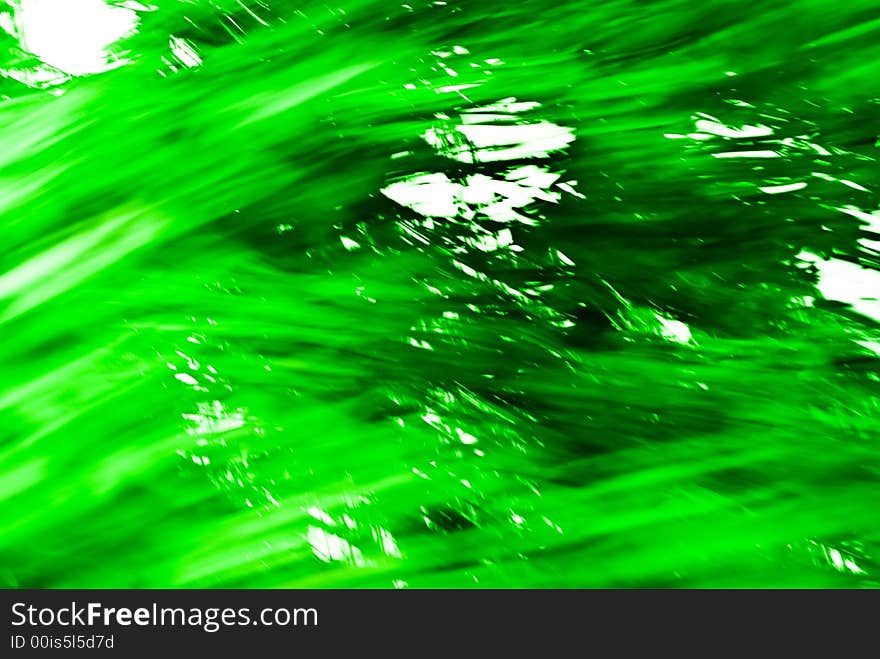 An abstract image created by using a slow shutter speed while moving and/or adjusting the focal length of the lens. Colors added and/or adjusted afterwards. An abstract image created by using a slow shutter speed while moving and/or adjusting the focal length of the lens. Colors added and/or adjusted afterwards.