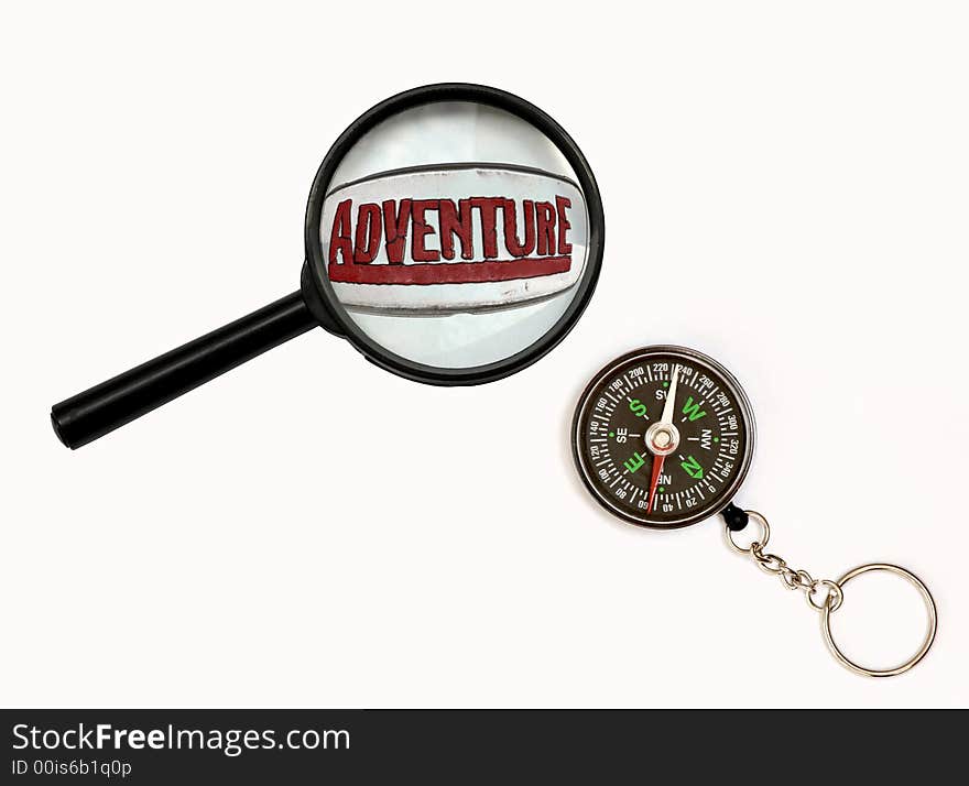 An image of magnifier and compass. An image of magnifier and compass