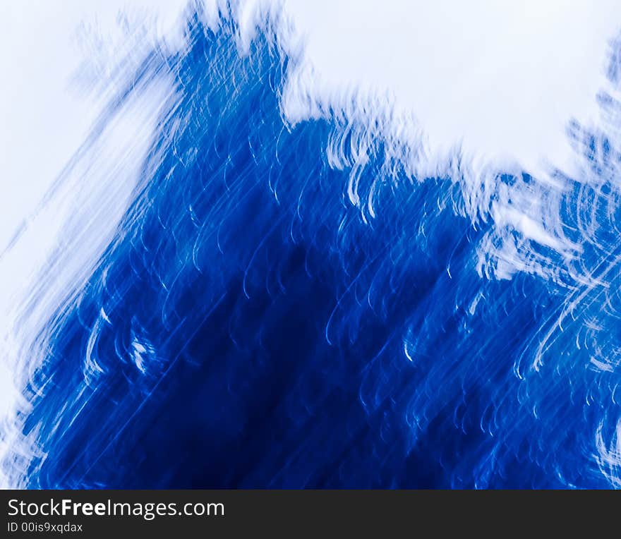 An abstract image created by using a slow shutter speed while moving and/or adjusting the focal length of the lens. Colors added and/or adjusted afterwards. An abstract image created by using a slow shutter speed while moving and/or adjusting the focal length of the lens. Colors added and/or adjusted afterwards.