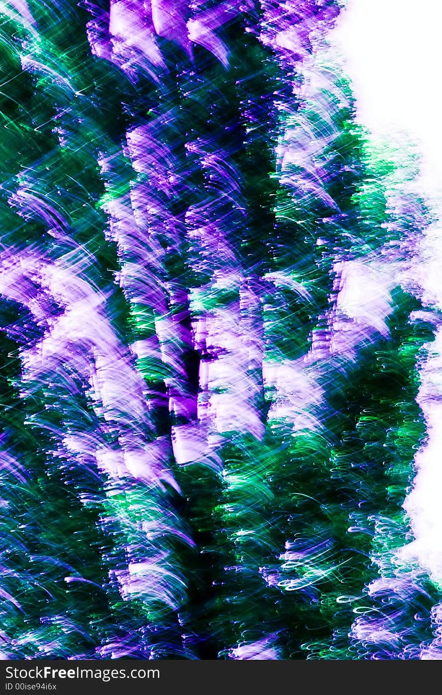 An abstract image created by using a slow shutter speed while moving and/or adjusting the focal length of the lens. Colors added and/or adjusted afterwards. An abstract image created by using a slow shutter speed while moving and/or adjusting the focal length of the lens. Colors added and/or adjusted afterwards.