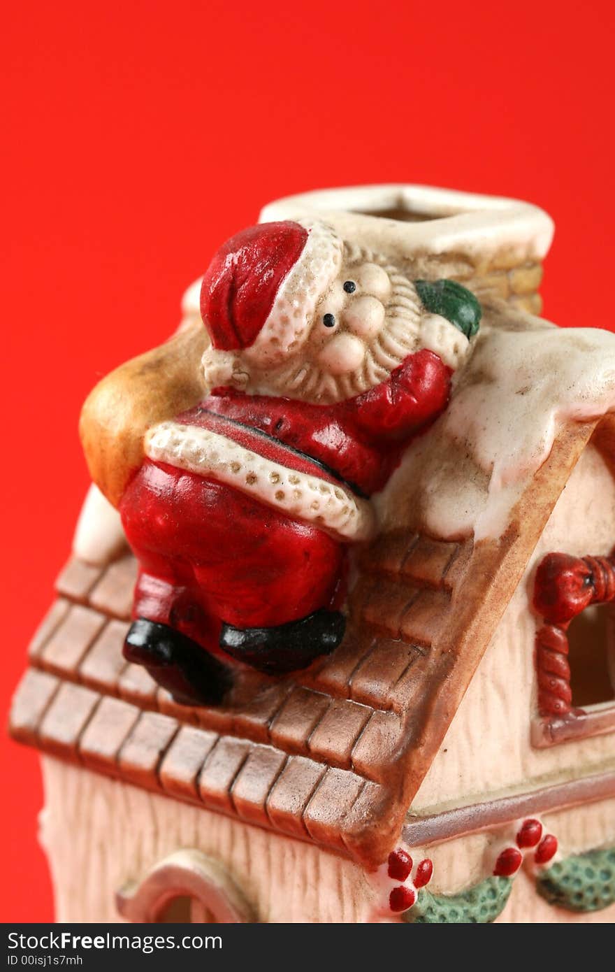 Santa Claus on roof of the house. Santa Claus on roof of the house