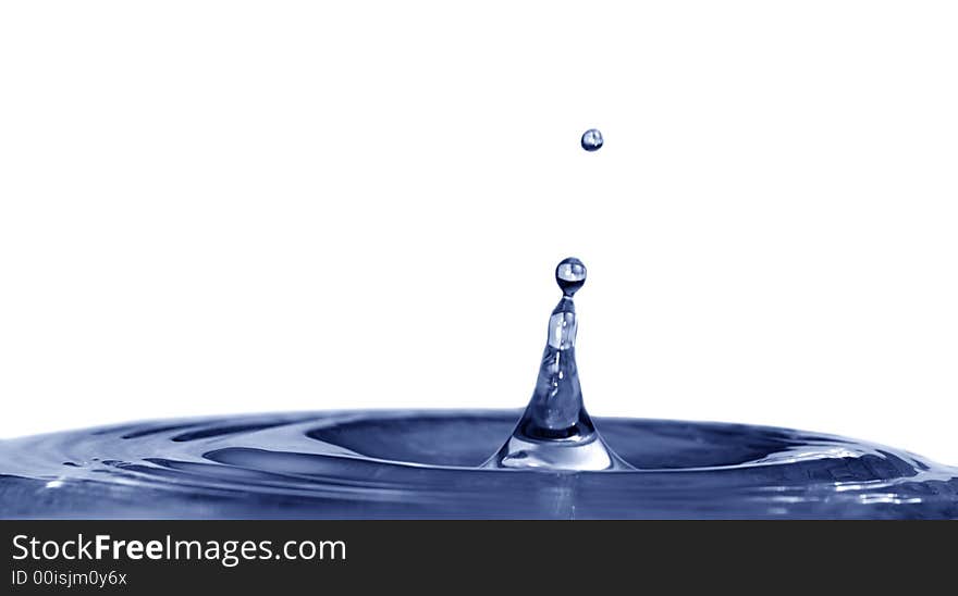 Isolated blue drops are falling down and impact with liquid surface. Isolated blue drops are falling down and impact with liquid surface