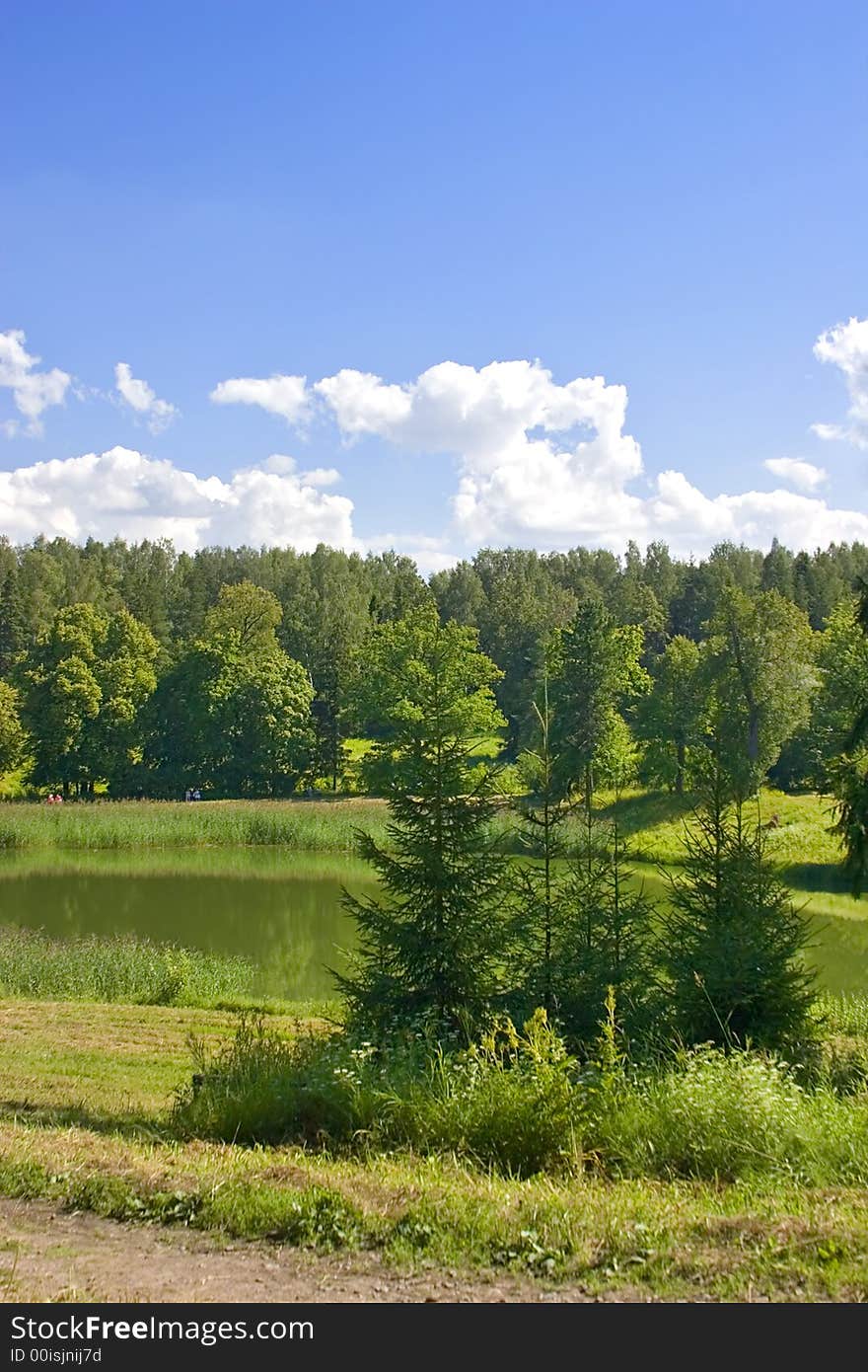 Landscape with blue sky, clouds, forest and lake. Landscape with blue sky, clouds, forest and lake