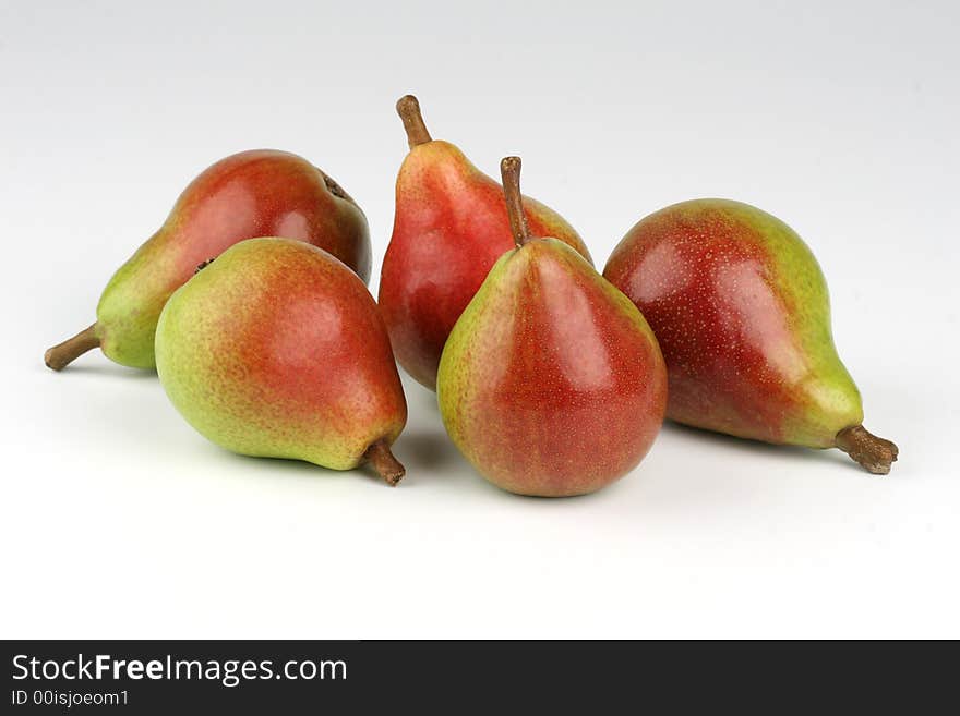 Five pears on the white background