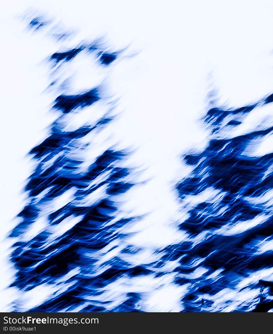 An abstract image created by using a slow shutter speed while moving and/or adjusting the focal length of the lens. Colors added and/or adjusted afterwards. An abstract image created by using a slow shutter speed while moving and/or adjusting the focal length of the lens. Colors added and/or adjusted afterwards.