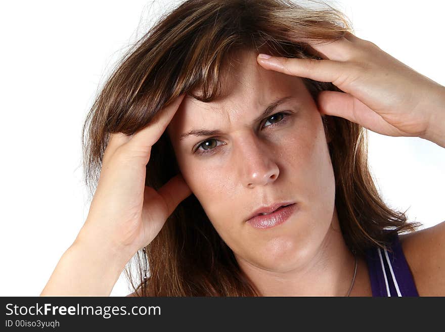 A young woman with headache is holfing her head in pain. A young woman with headache is holfing her head in pain.