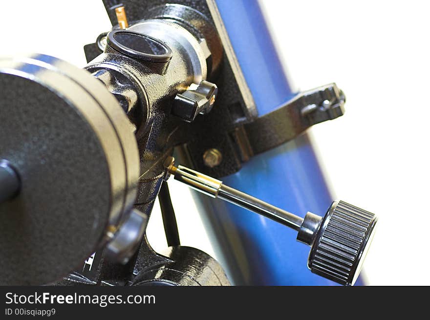 Focusing mechanism and counterweight detail of an astronomical refractor telescope. Focusing mechanism and counterweight detail of an astronomical refractor telescope.