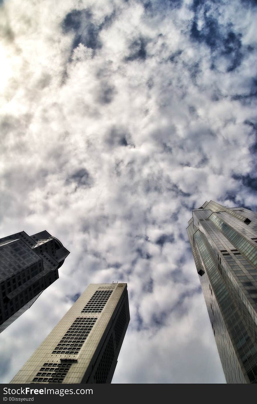 Office towers and a dramatic sky as backdrop. Office towers and a dramatic sky as backdrop