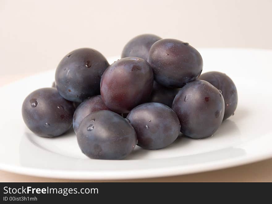 Fresh Plums On The Plate