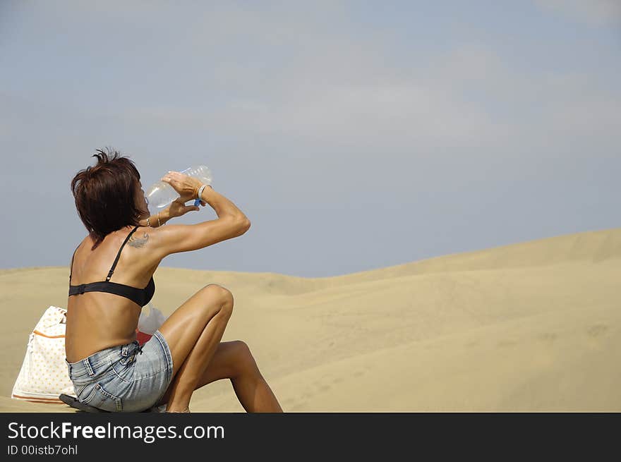 Woman, Water And Desert