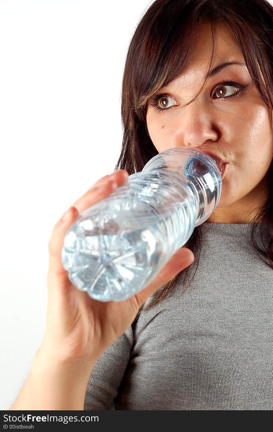 Attractive woman with bottle isolated on white background. Attractive woman with bottle isolated on white background