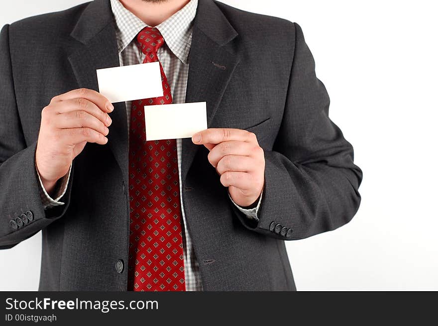 Businessman holding blank visiting cards. Businessman holding blank visiting cards