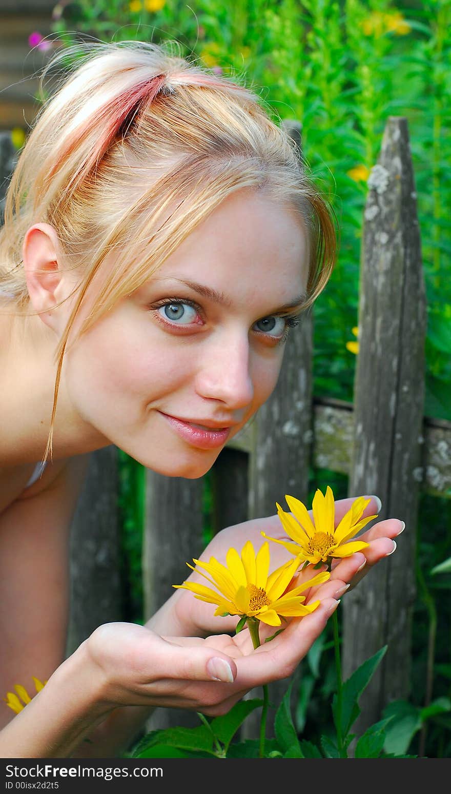 The girl and yellow flowers