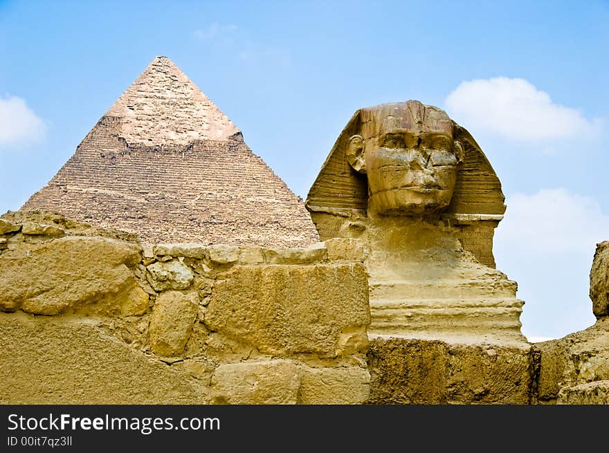 The great sphinx guarding a pyramid. The great sphinx guarding a pyramid