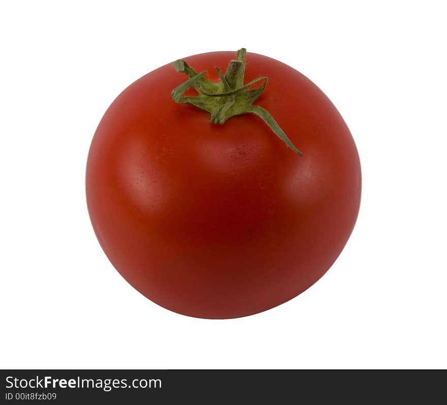 A red ripe tomato on a white surface. A red ripe tomato on a white surface.