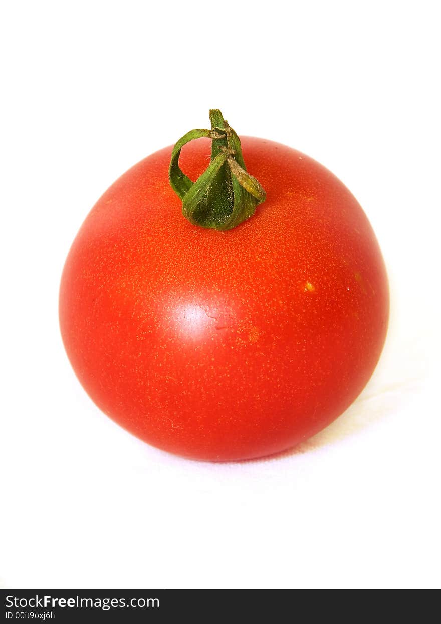 Red tomato isolated on the white background