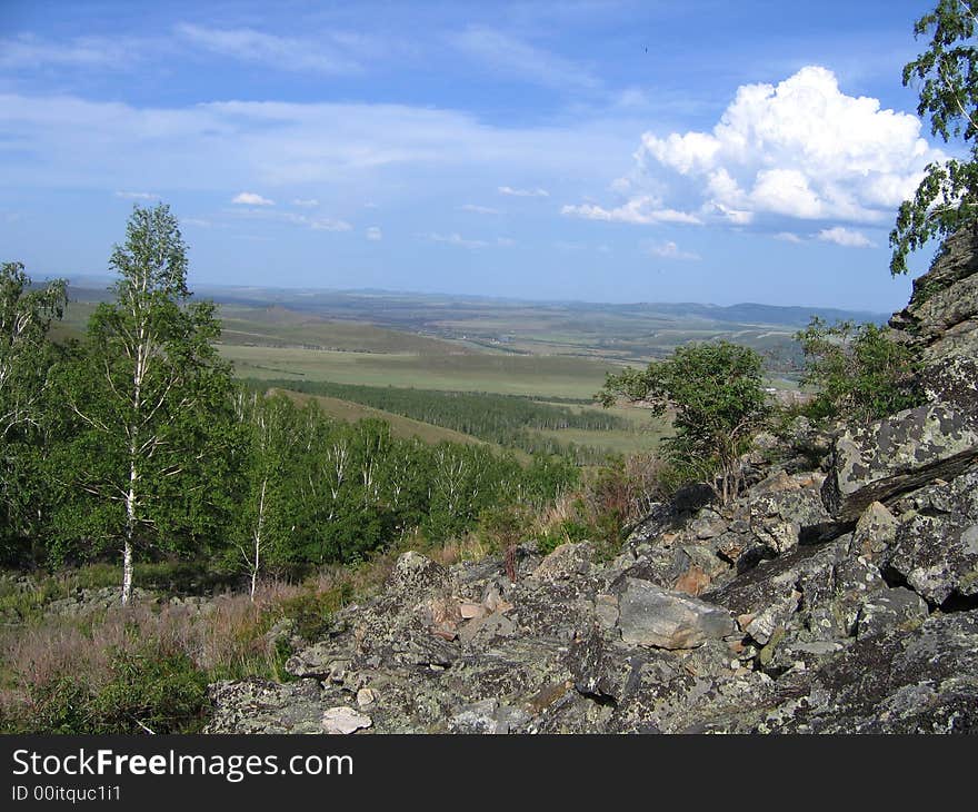 The valley of the Unda river. Summer rock.