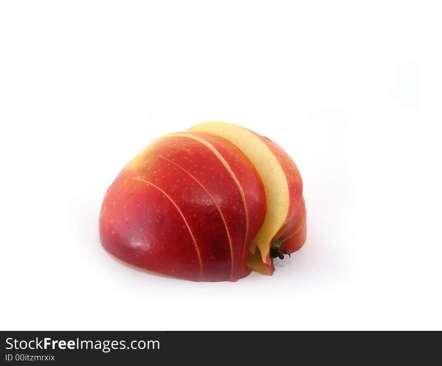 Slices of apple variety called Montuan, isolated on white. Slices of apple variety called Montuan, isolated on white.