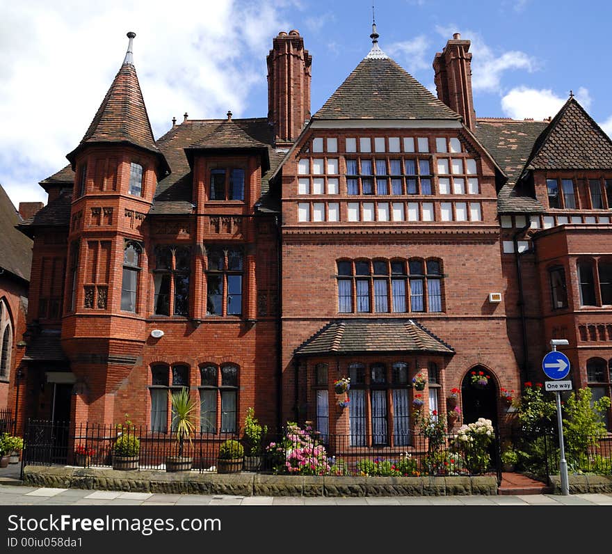 Old English terraced house in the gothic style built and designed by the famous architect John Douglas. Old English terraced house in the gothic style built and designed by the famous architect John Douglas