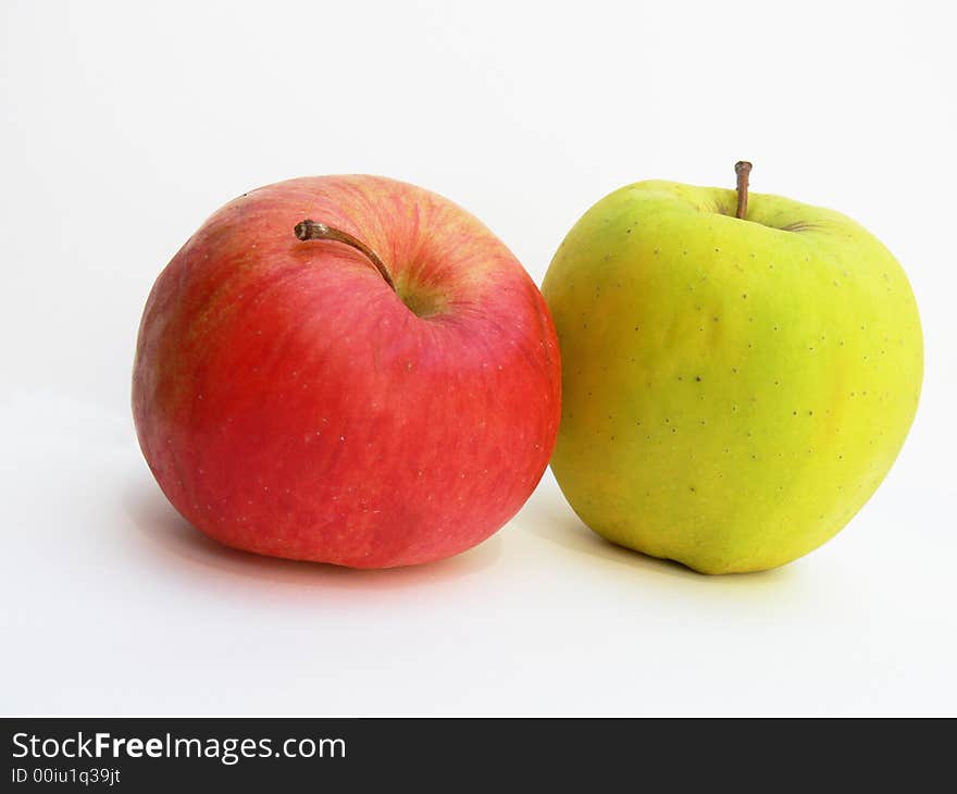 Two apples on the white background. Two apples on the white background.