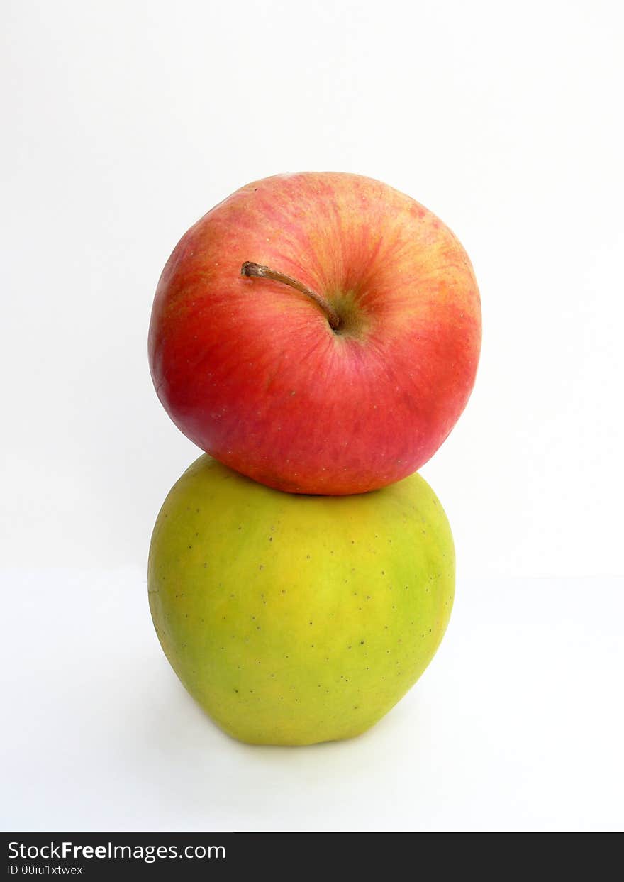 Two apples on the white background. Two apples on the white background.