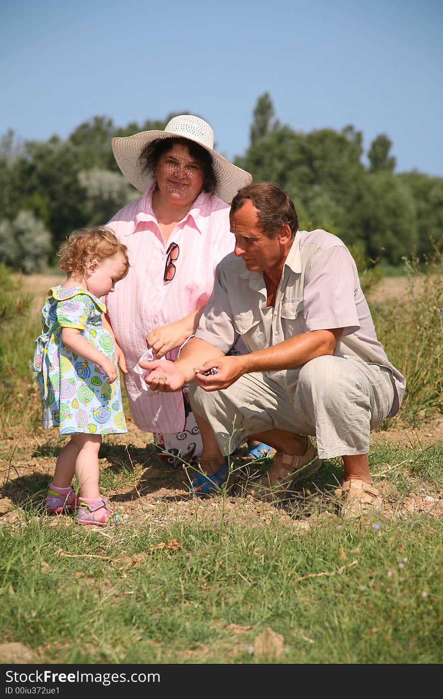 Elderly pair with the granddaughter. Elderly pair with the granddaughter