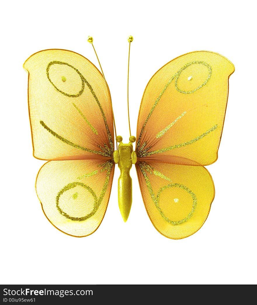 Artificial yellow butterfly on white background