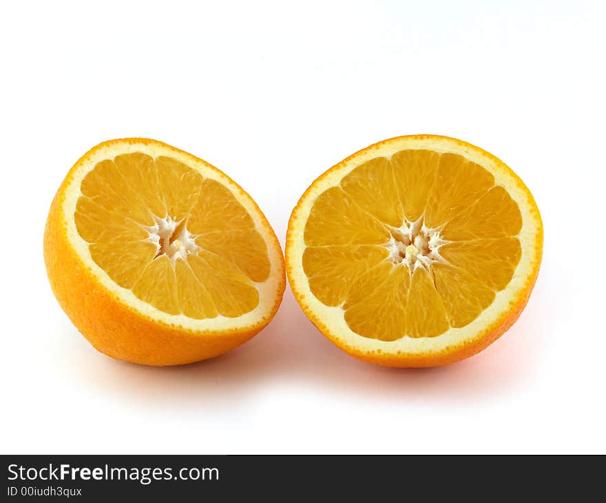 An orange solated on white background. An orange solated on white background.