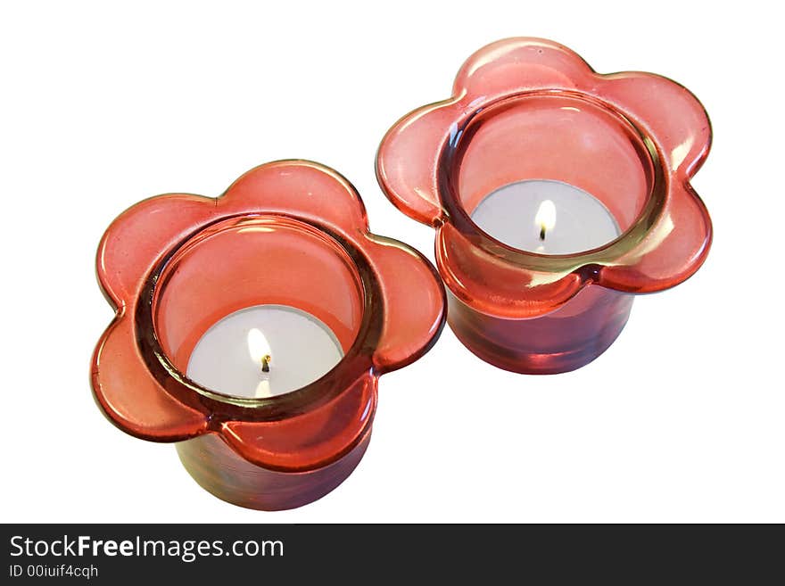 Red candle holders isolated on white.