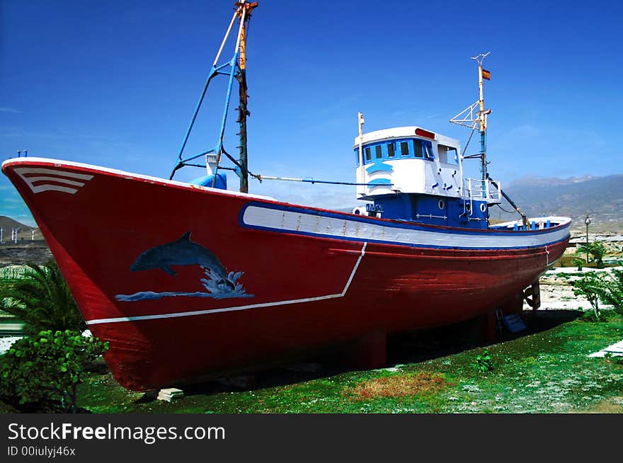 A view of a boat on land with mount Teide in the back ground Tenerife. A view of a boat on land with mount Teide in the back ground Tenerife.