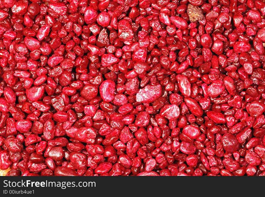 Close-up photo of small colorful mineral grain. Close-up photo of small colorful mineral grain