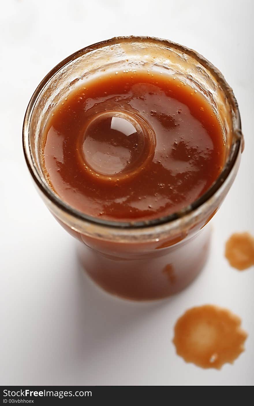 Tomato juice on white isolated background