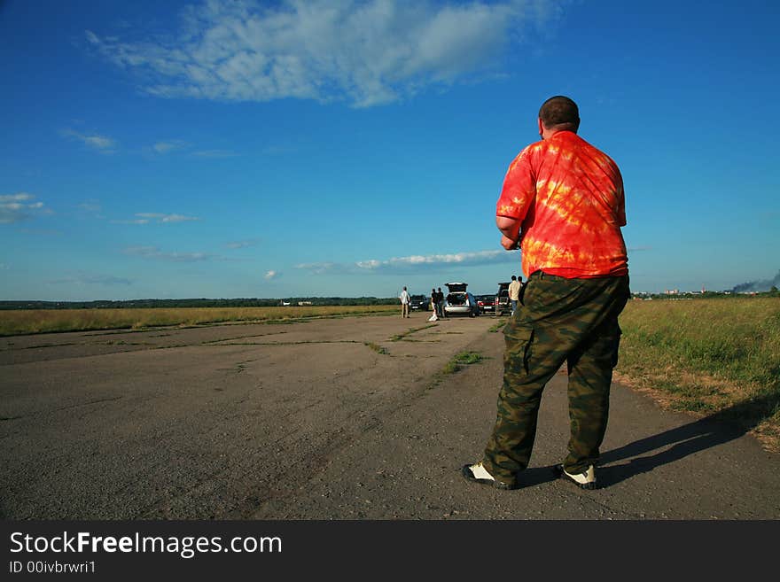 Man In A Red Vest