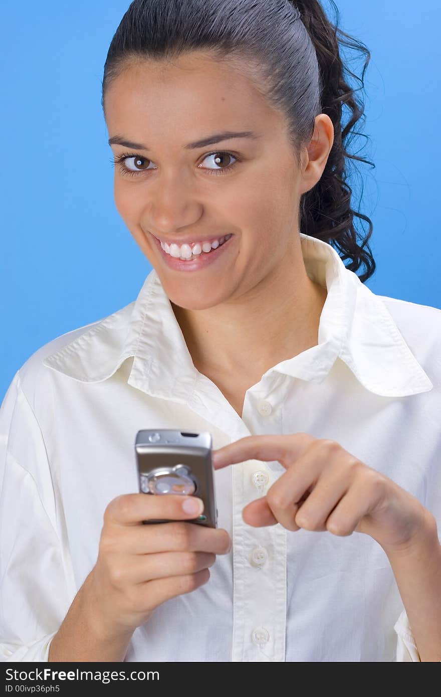 Beautiful young girl holding phone. Beautiful young girl holding phone