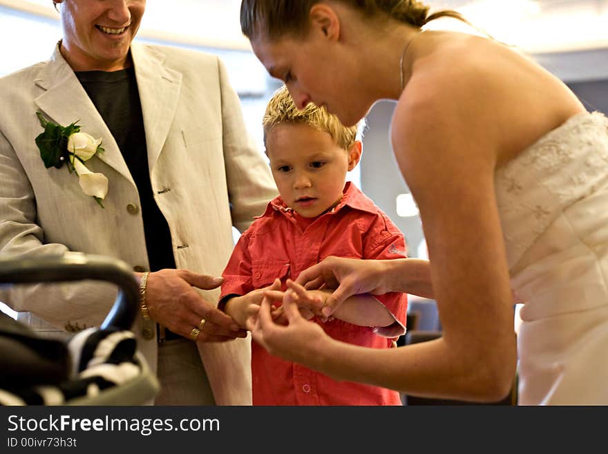 Pictures shooten on a wedding day from a beauty couple and child. Pictures shooten on a wedding day from a beauty couple and child