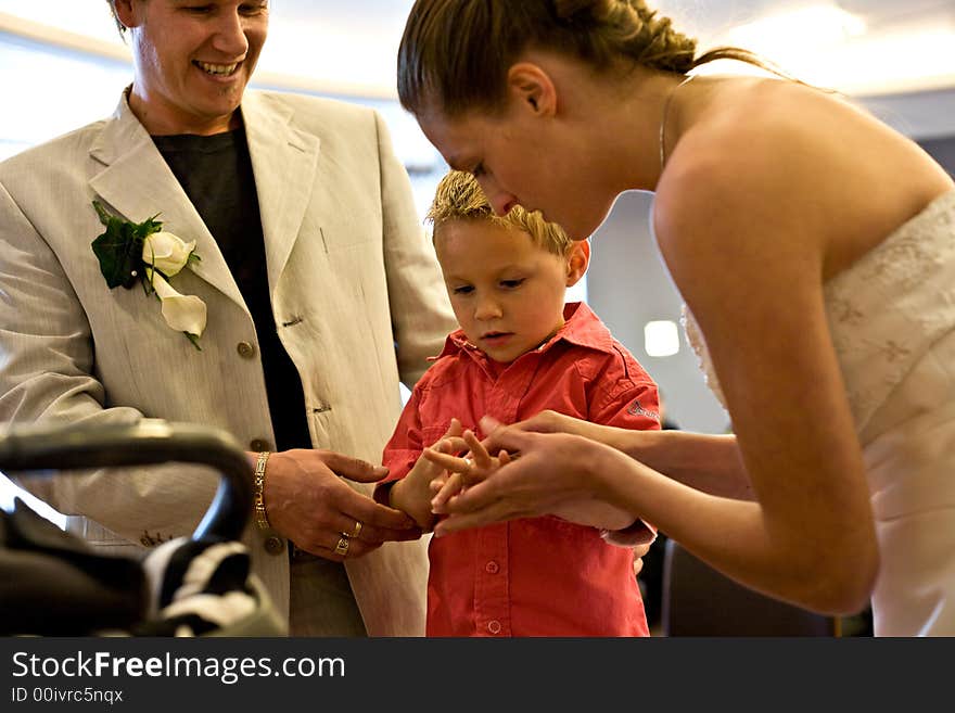 Pictures shooten on a wedding day from a beauty couple and child. Pictures shooten on a wedding day from a beauty couple and child