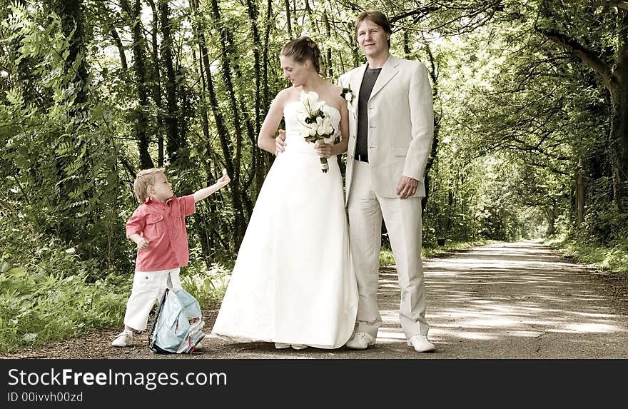 Pictures shooten on a wedding day from a beauty couple and child. Pictures shooten on a wedding day from a beauty couple and child